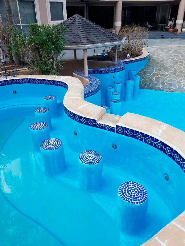 Commercial pool construction - pool with bar stools